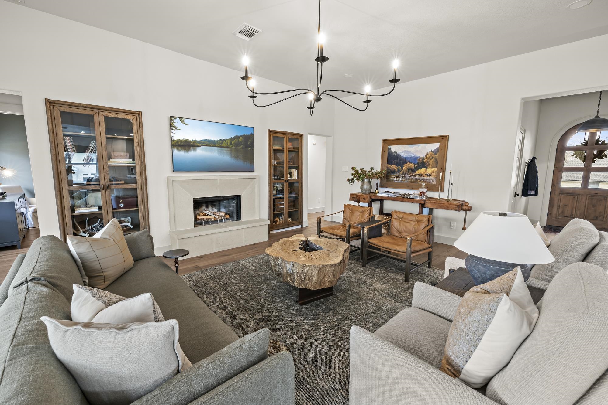 270 Chaparral Meadowlakes, TX 78654 - Photo 7 of 28 a living room with furniture kitchen view and a fireplace
