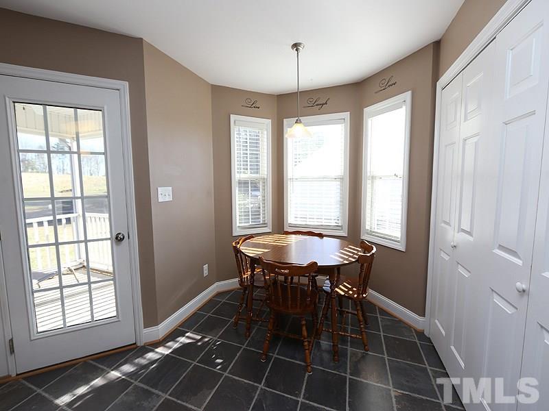 381 Hill Road Rougemont, NC 27572 - Photo 5 of 12 a dining room with furniture and window