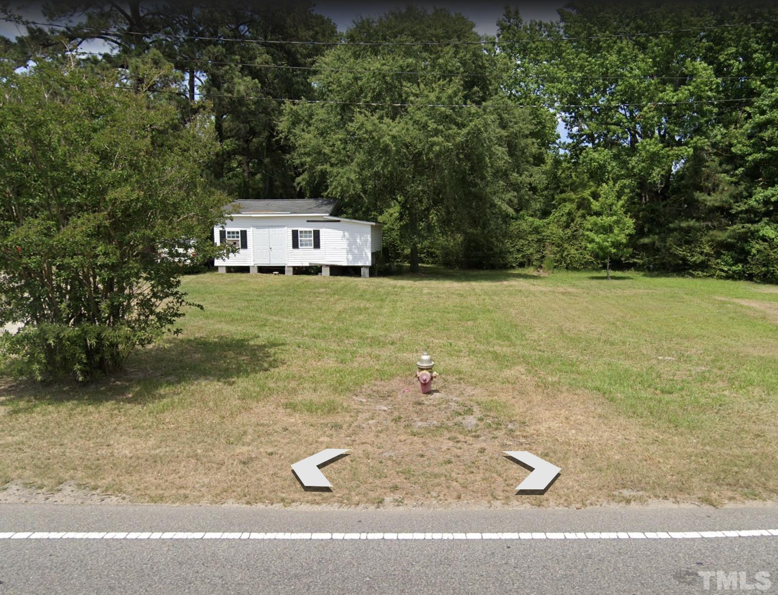 0 Iris Bryant Road Erwin, NC 28339 - Photo 3 of 3 a view of a big yard with potted plants