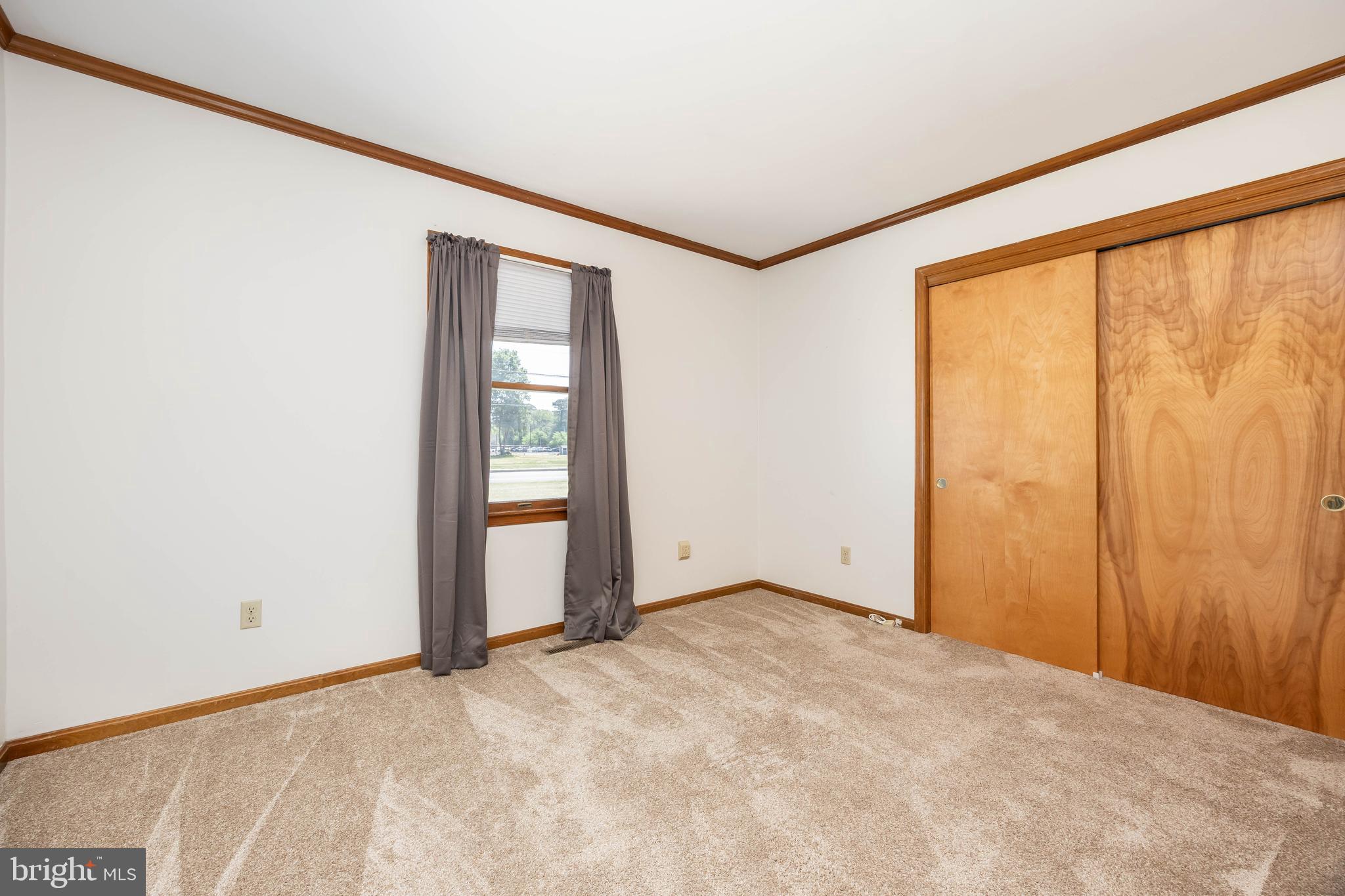 9830 Sharptown Road Mardela Springs, MD 21837 - Photo 26 of 51 a view of an empty room with a window