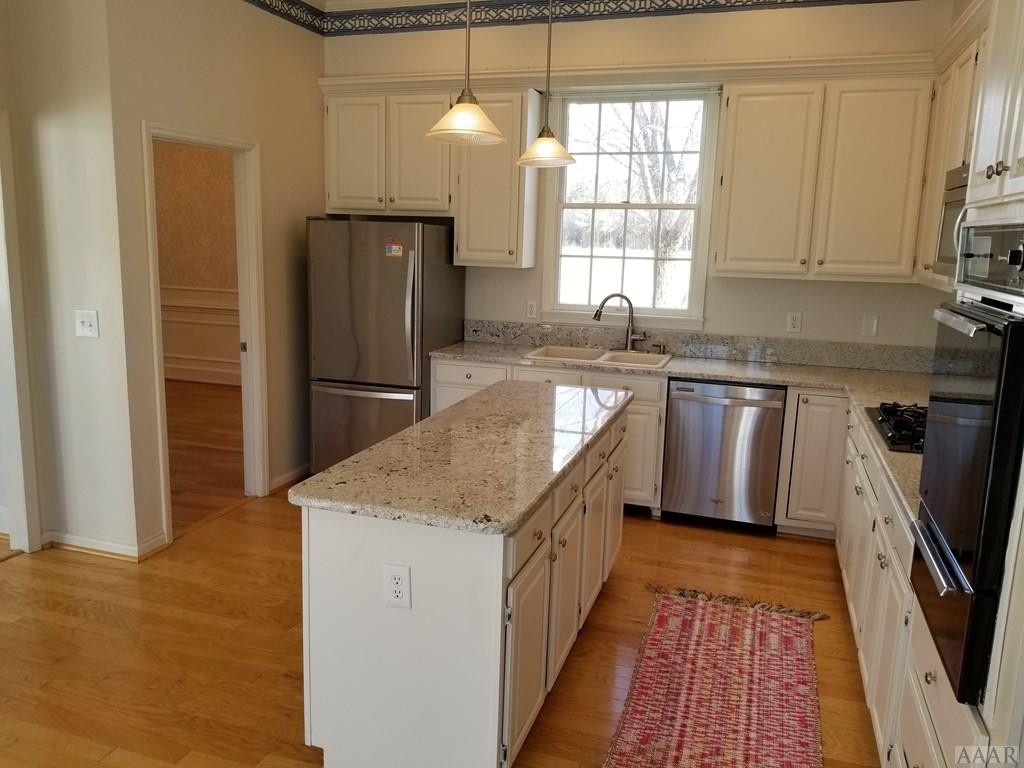 547 Ownley Road Elizabeth City, NC 27909 - Photo 12 of 56 Kitchen flows into dining room and den.