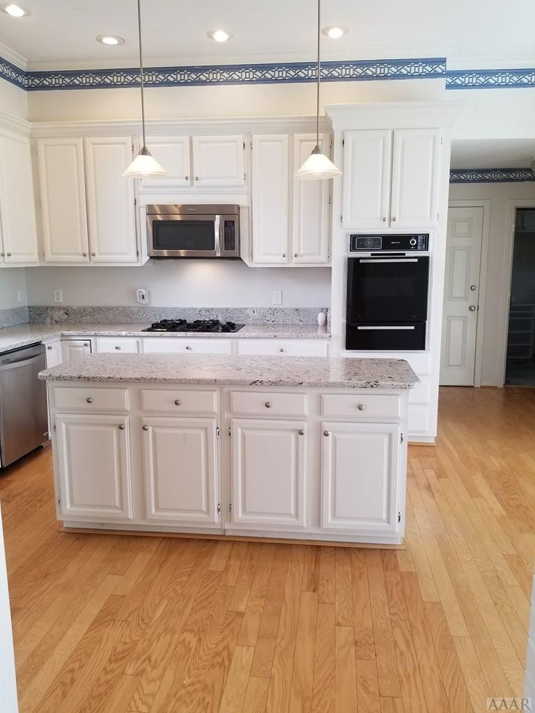 547 Ownley Road Elizabeth City, NC 27909 - Photo 13 of 56 Large kitchen island with tons of storage