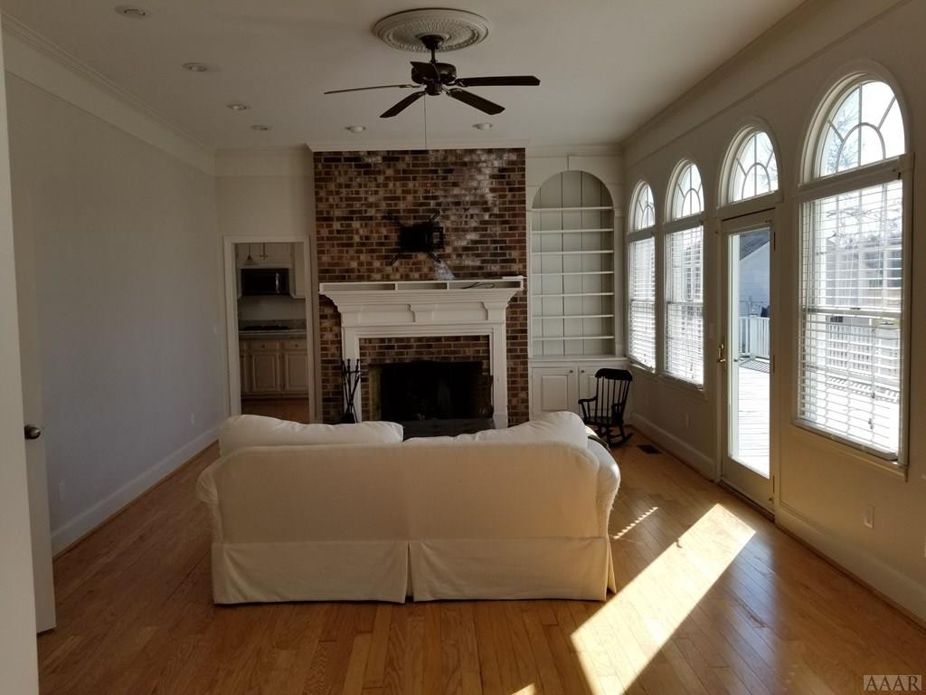 547 Ownley Road Elizabeth City, NC 27909 - Photo 17 of 56 Den with working brick fireplace