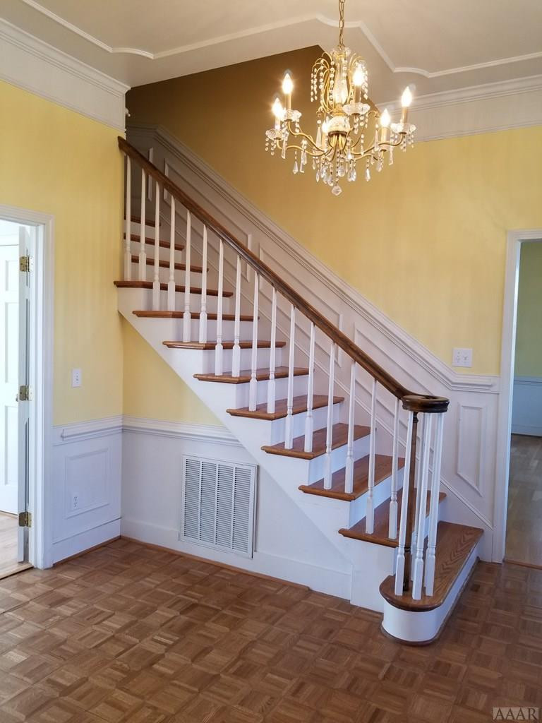 547 Ownley Road Elizabeth City, NC 27909 - Photo 4 of 56 Grand staircase and foyer chandelier