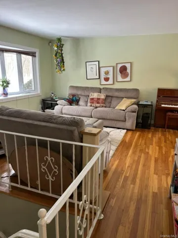 a bed room with two beds and a window