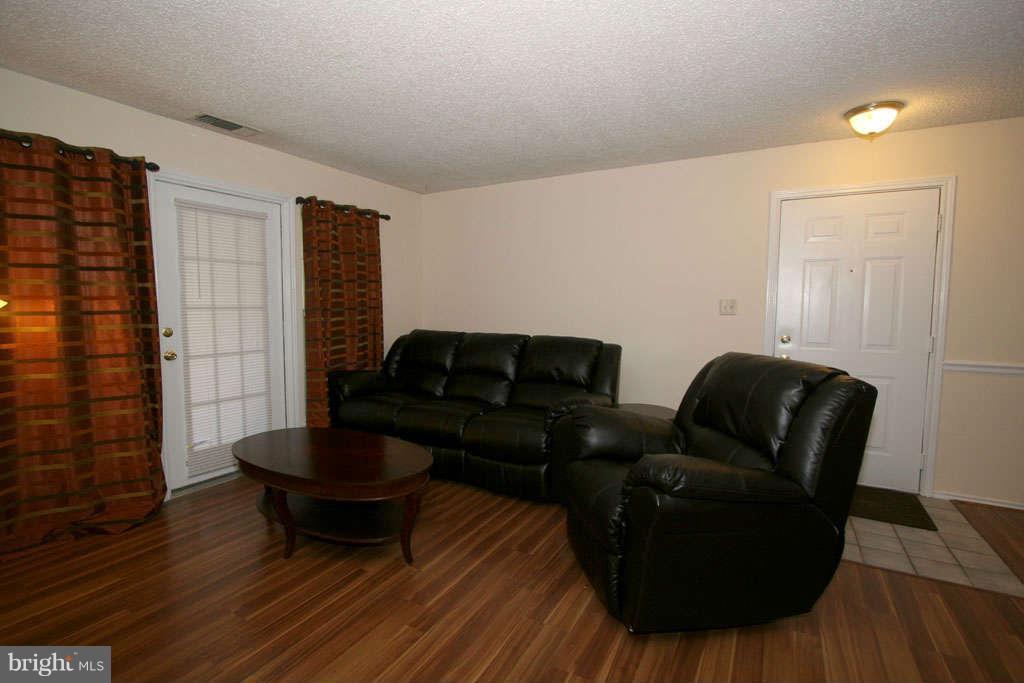 21013 Timber Ridge Terrace, Unit 103 Ashburn, VA 20147 - Photo 11 of 16 Living Room