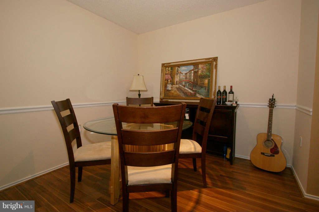 21013 Timber Ridge Terrace, Unit 103 Ashburn, VA 20147 - Photo 13 of 16 Dining Room
