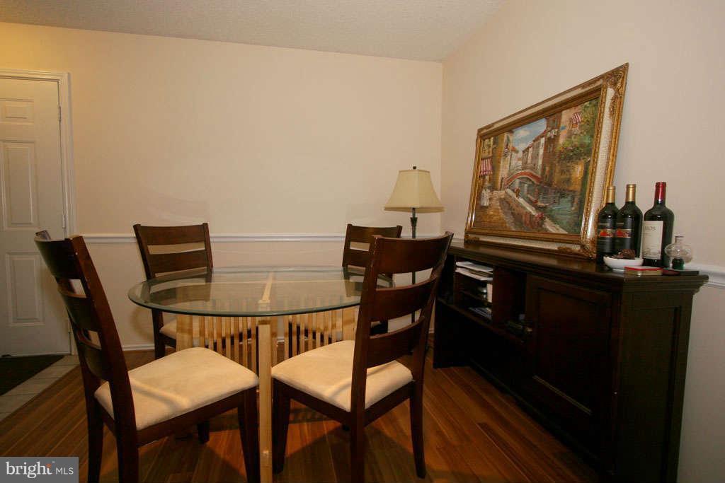 21013 Timber Ridge Terrace, Unit 103 Ashburn, VA 20147 - Photo 14 of 16 Dining Room