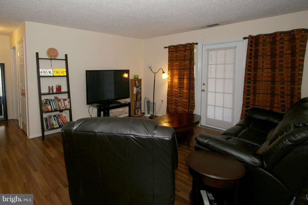 21013 Timber Ridge Terrace, Unit 103 Ashburn, VA 20147 - Photo 15 of 16 Living Room