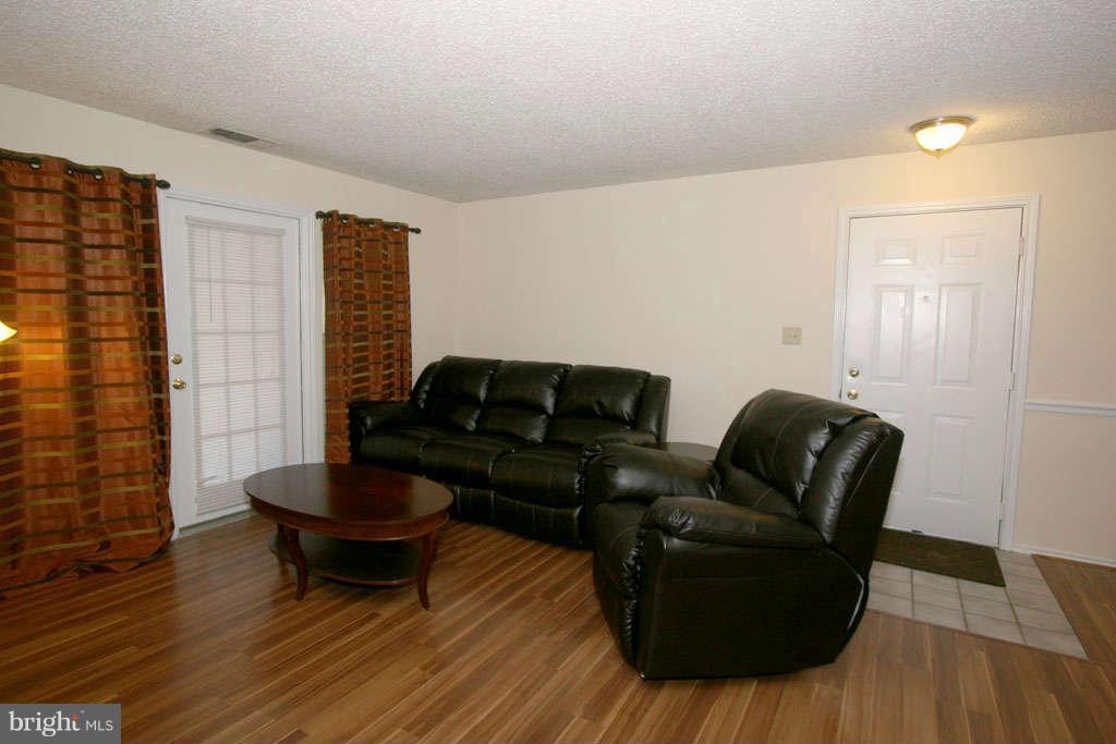 21013 Timber Ridge Terrace, Unit 103 Ashburn, VA 20147 - Photo 16 of 16 Living Room