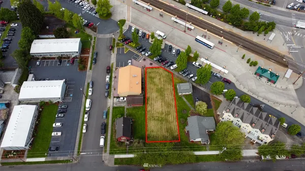 an aerial view of residential house and outdoor space