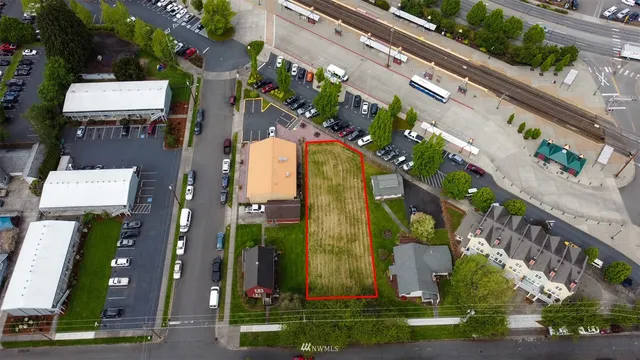 an aerial view of residential house and outdoor space