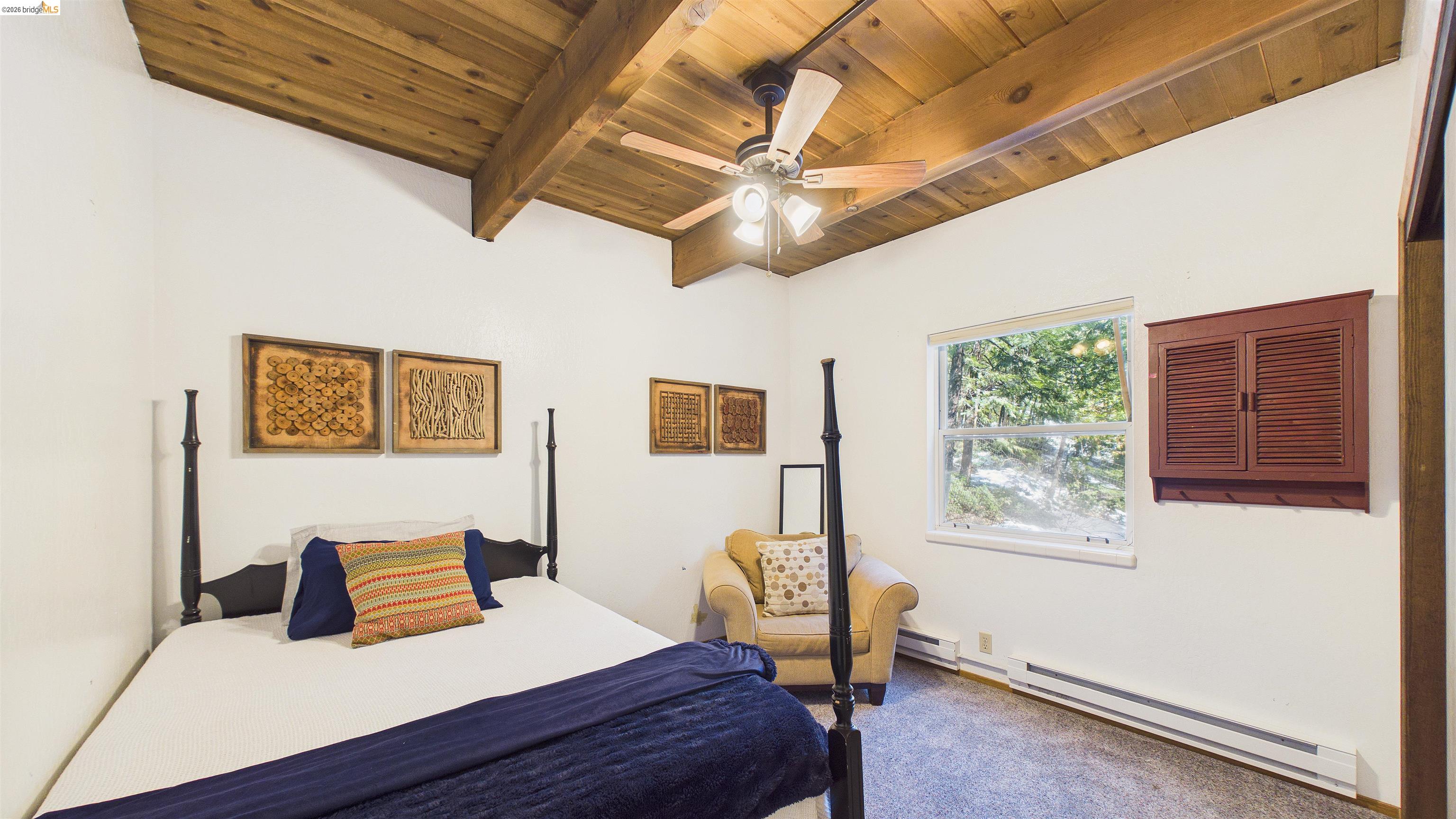 26570 Crystal Road Long Barn, CA 95335 - Photo 15 of 39 Vaulted wood-paneled ceiling with exposed beams