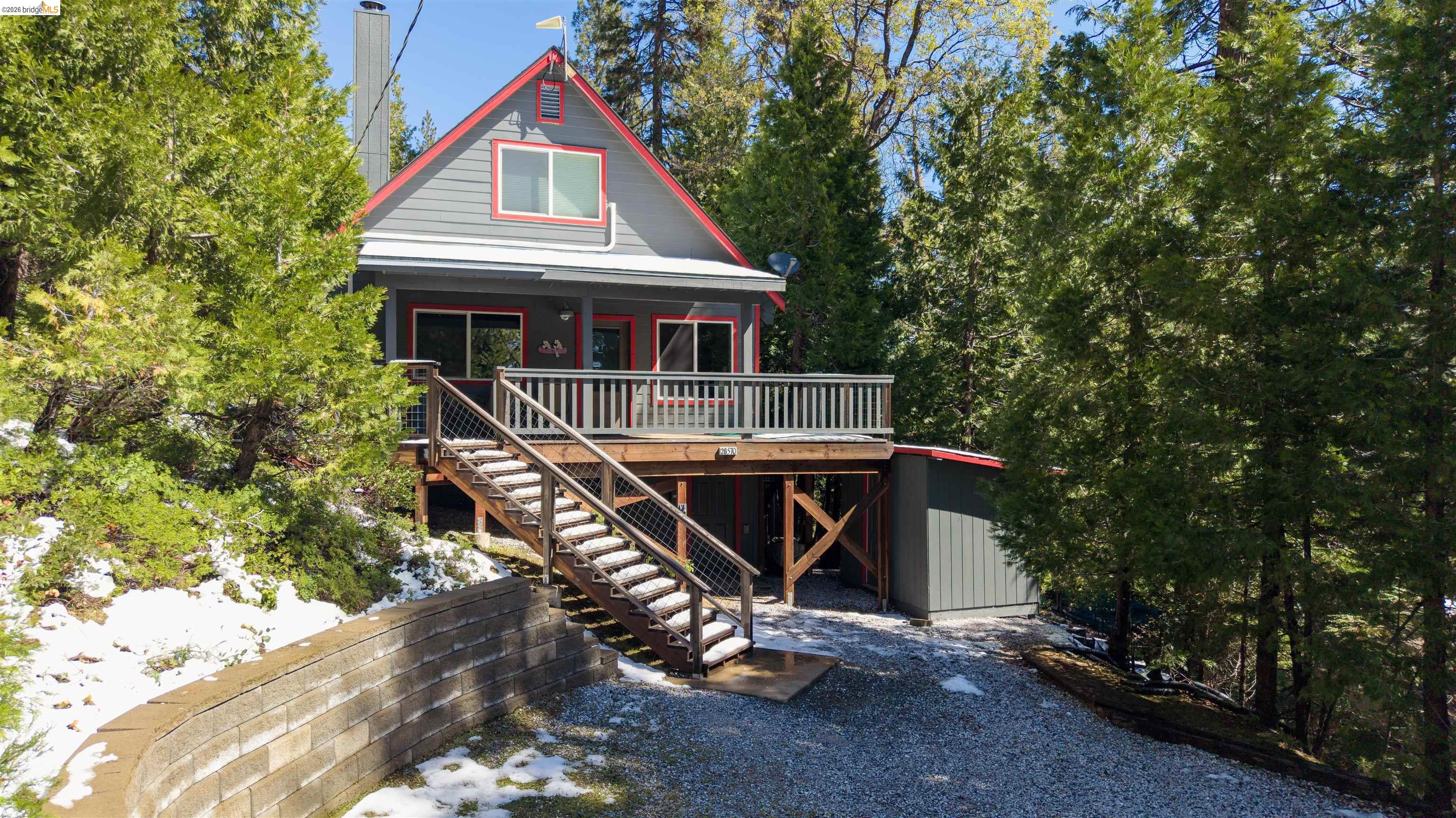 26570 Crystal Road Long Barn, CA 95335 - Photo 3 of 39 A-frame style residence with a gray exterior and red trim