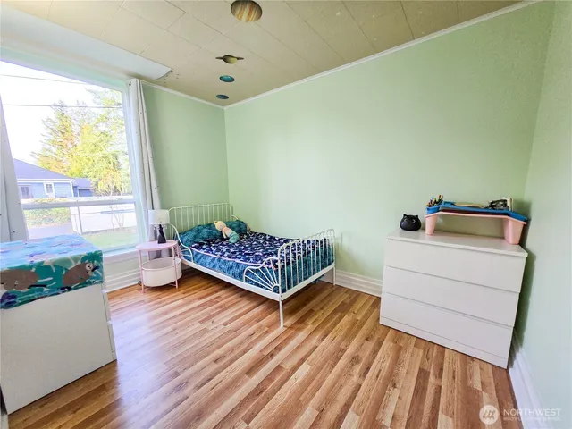a bathroom with a sink toilet vanity and bathtub