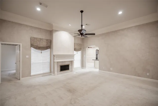 a kitchen with cabinets and a stove