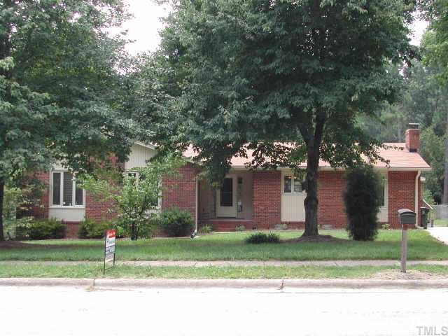 3601 Morningside Drive Raleigh, NC 27607 - Photo 1 of 1 a house that has a tree in front of it