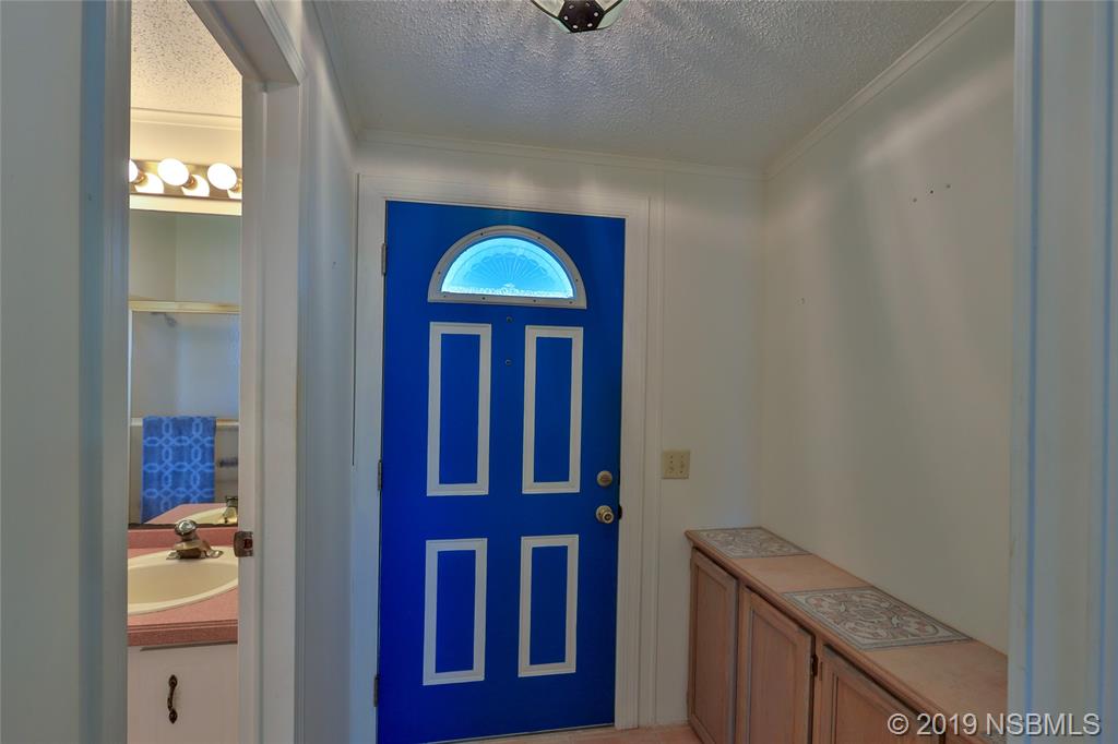 803 Navigators Way Edgewater, FL 32141 - Photo 12 of 27 a view of front door