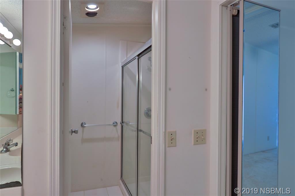 803 Navigators Way Edgewater, FL 32141 - Photo 20 of 27 a bathroom with a shower