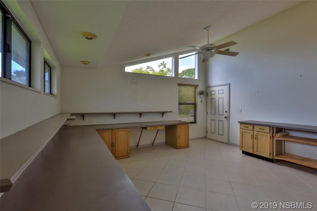 803 Navigators Way Edgewater, FL 32141 - Photo 23 of 27 a view of swimming pool with seating space
