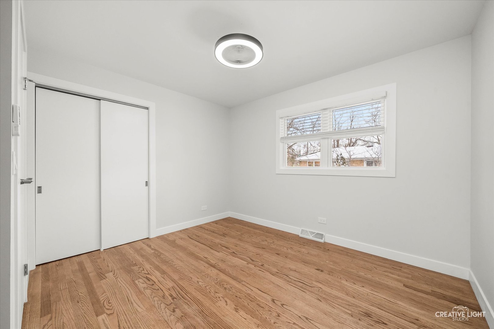 704 Plainfield Road Downers Grove, IL 60516 - Photo 18 of 36 a view of empty room with wooden floor