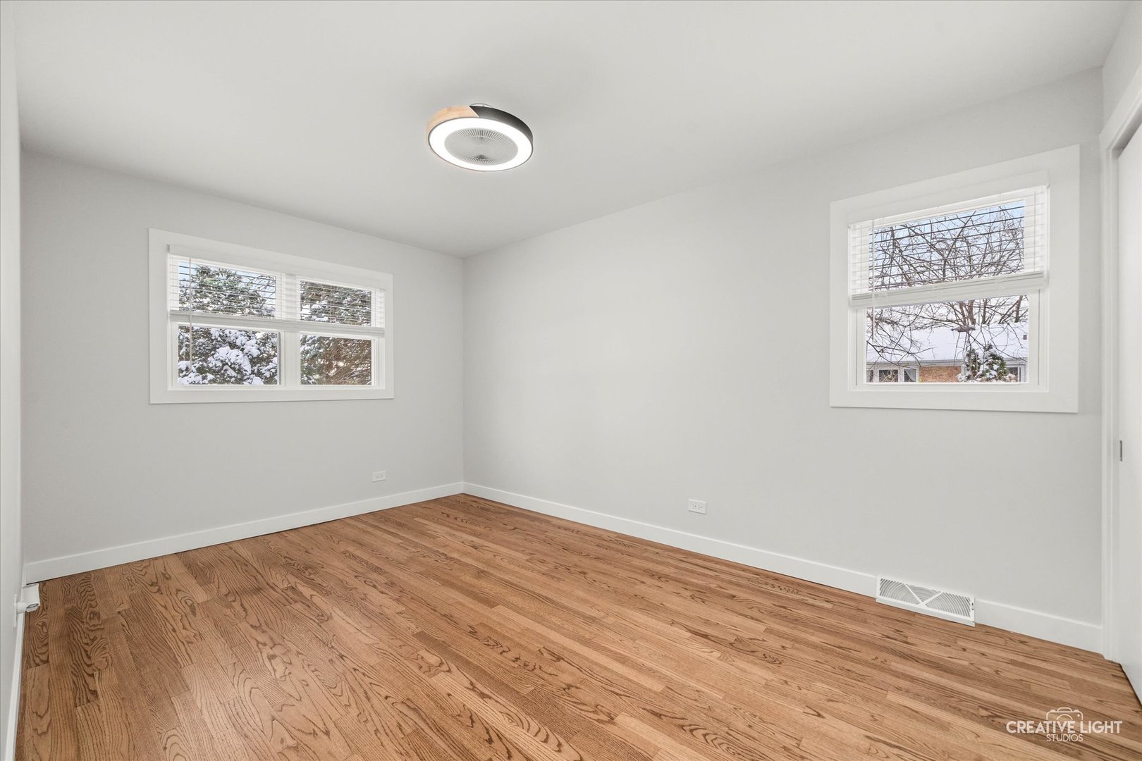 704 Plainfield Road Downers Grove, IL 60516 - Photo 19 of 36 a view of empty room with wooden floor