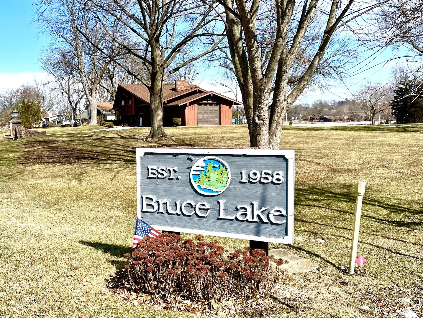 704 Plainfield Road Downers Grove, IL 60516 - Photo 33 of 36 a sign board with a tree