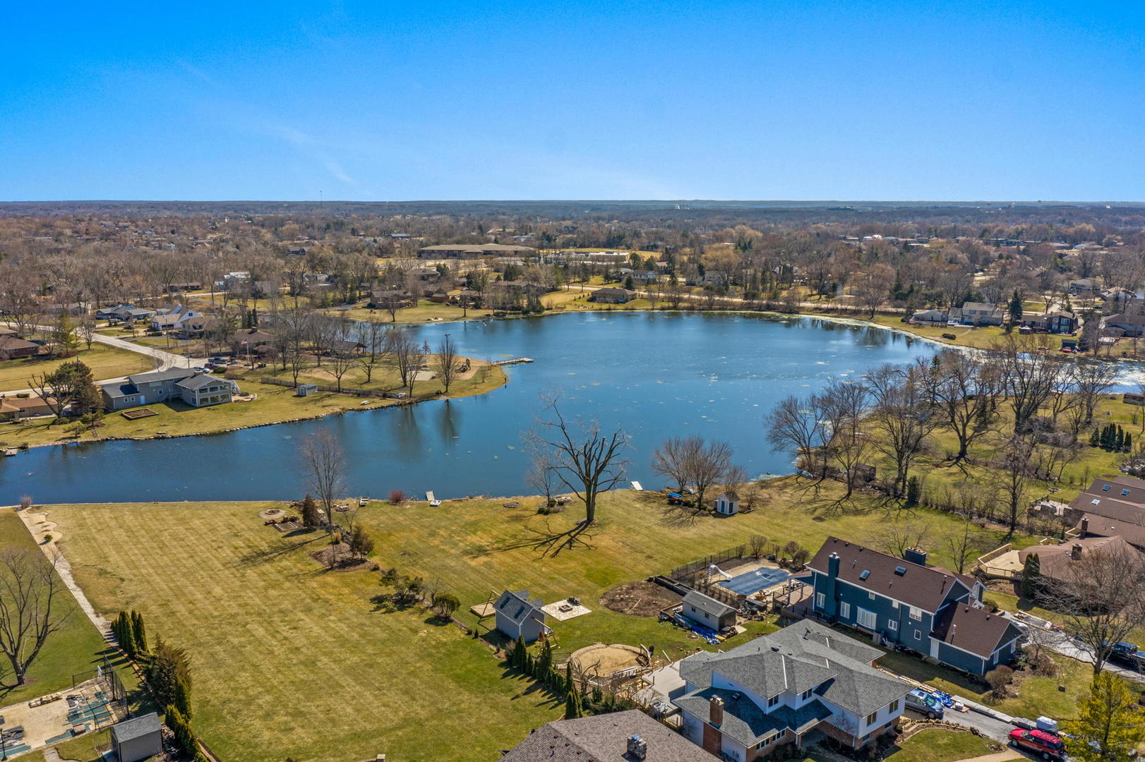 704 Plainfield Road Downers Grove, IL 60516 - Photo 35 of 36 an aerial view of a houses with a lake
