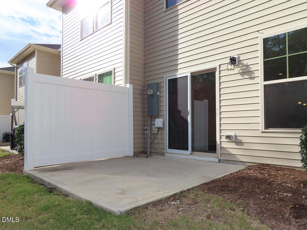 1217 Compass Drive Durham, NC 27713 - Photo 22 of 29 a view of a house with a backyard