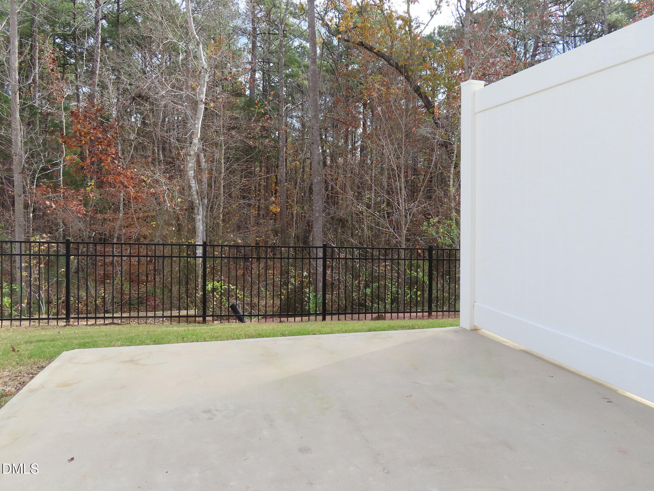 1217 Compass Drive Durham, NC 27713 - Photo 23 of 29 a view of a backyard with fence