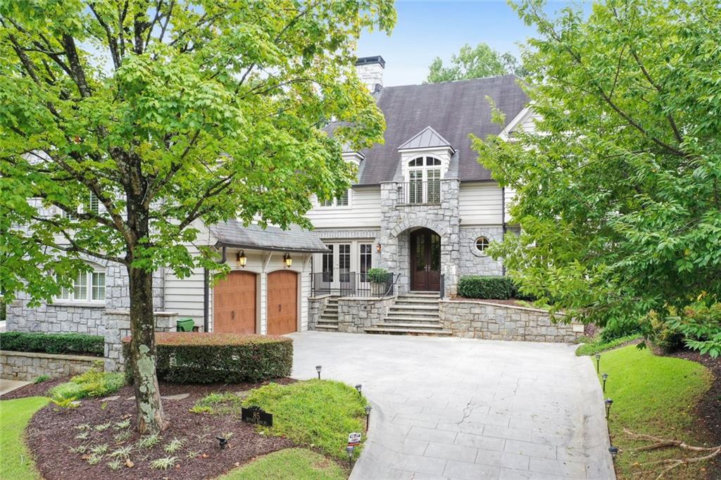 a view of house with a garden