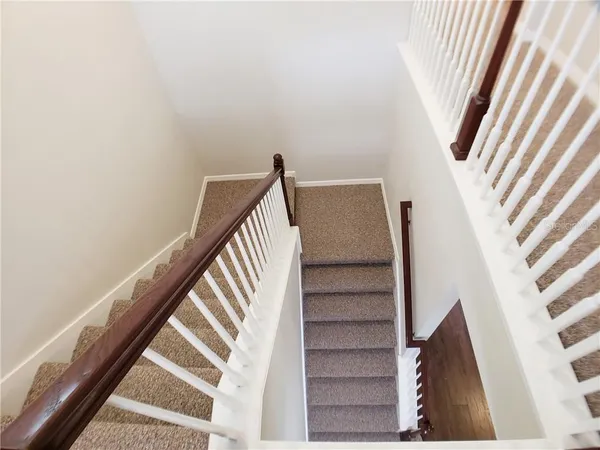 a view of entryway with stairs