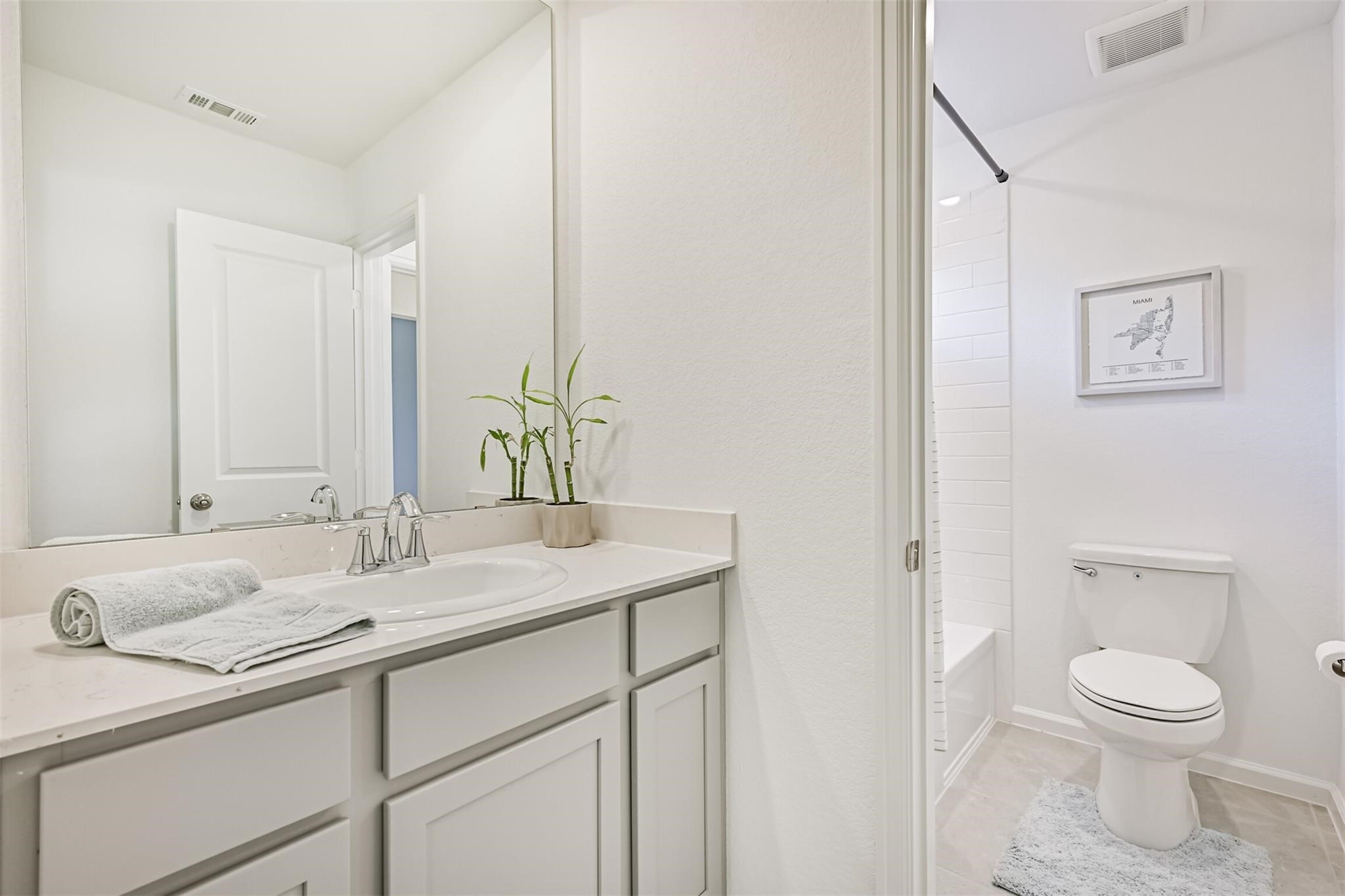 5010 Walnut Grv Lane Manvel, TX 77578 - Photo 40 of 46 a bathroom with a granite countertop sink a toilet and a mirror