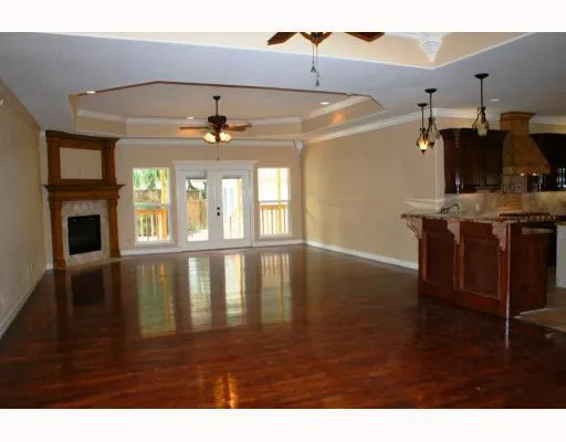 a view of an entryway and livingroom