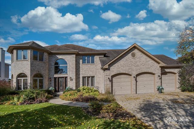 2809 Turnberry Road St. Charles, IL 60174 - Photo 1 of 21 a front view of a house with garden