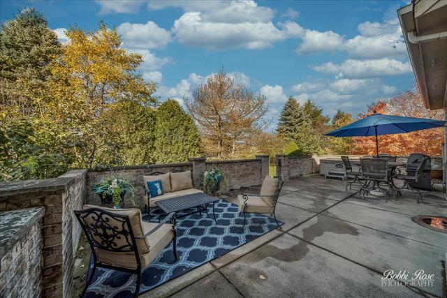 2809 Turnberry Road St. Charles, IL 60174 - Photo 2 of 21 a view of backyard with seating space and trees