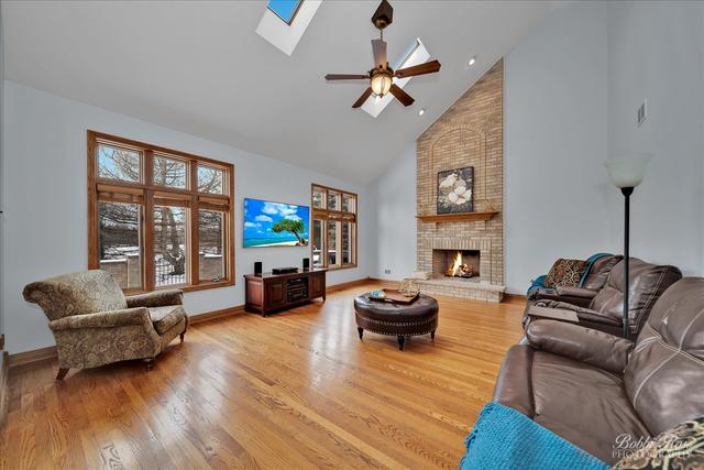 2809 Turnberry Road St. Charles, IL 60174 - Photo 11 of 21 a living room with furniture fireplace and flat screen tv