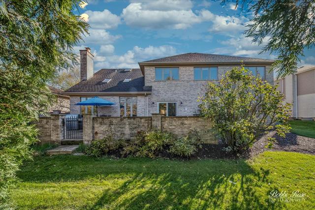 2809 Turnberry Road St. Charles, IL 60174 - Photo 18 of 21 a front view of a house with garden