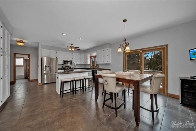 2809 Turnberry Road St. Charles, IL 60174 - Photo 8 of 21 a dining room with furniture and window