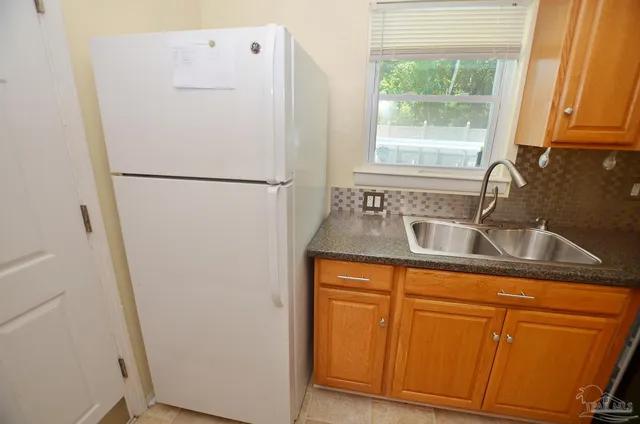 a view of a livingroom with furniture and a fireplace