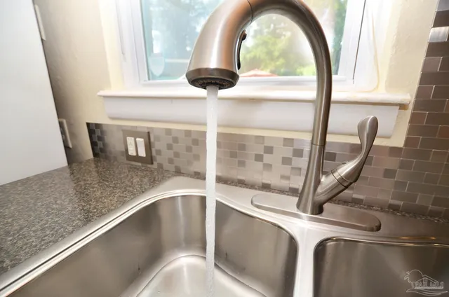 a view of a dining area with furniture and a window