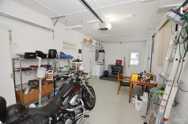 a view of a backyard with sitting area