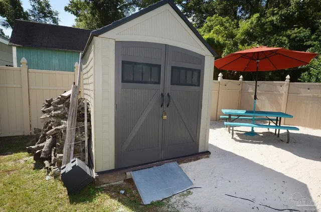 a view of a street with a building in the background