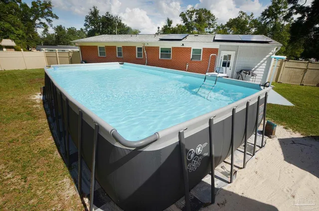 a kitchen that has a sink and a stove