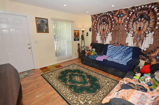 a kitchen with a refrigerator and a sink