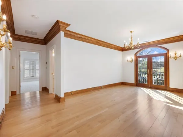 a kitchen with granite countertop cabinets and window
