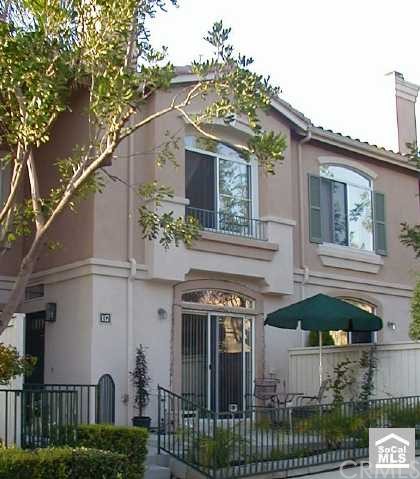 Beautiful townhome with great front patio.  This home faces the park with views of the basketball court, tennis courts and playground.