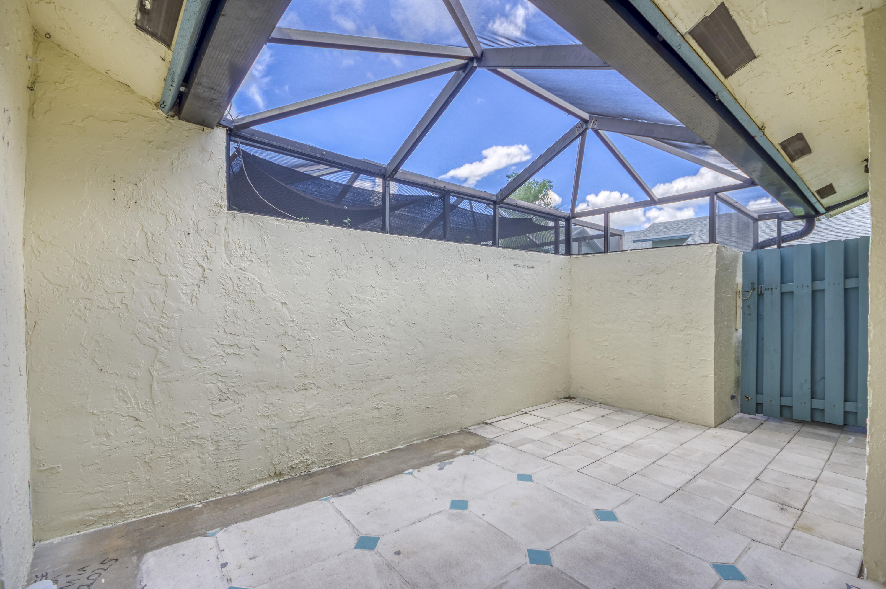 9109 Southwest 21st Street, Unit E Boca Raton, FL 33428 - Photo 18 of 24 a view of a backyard of a house