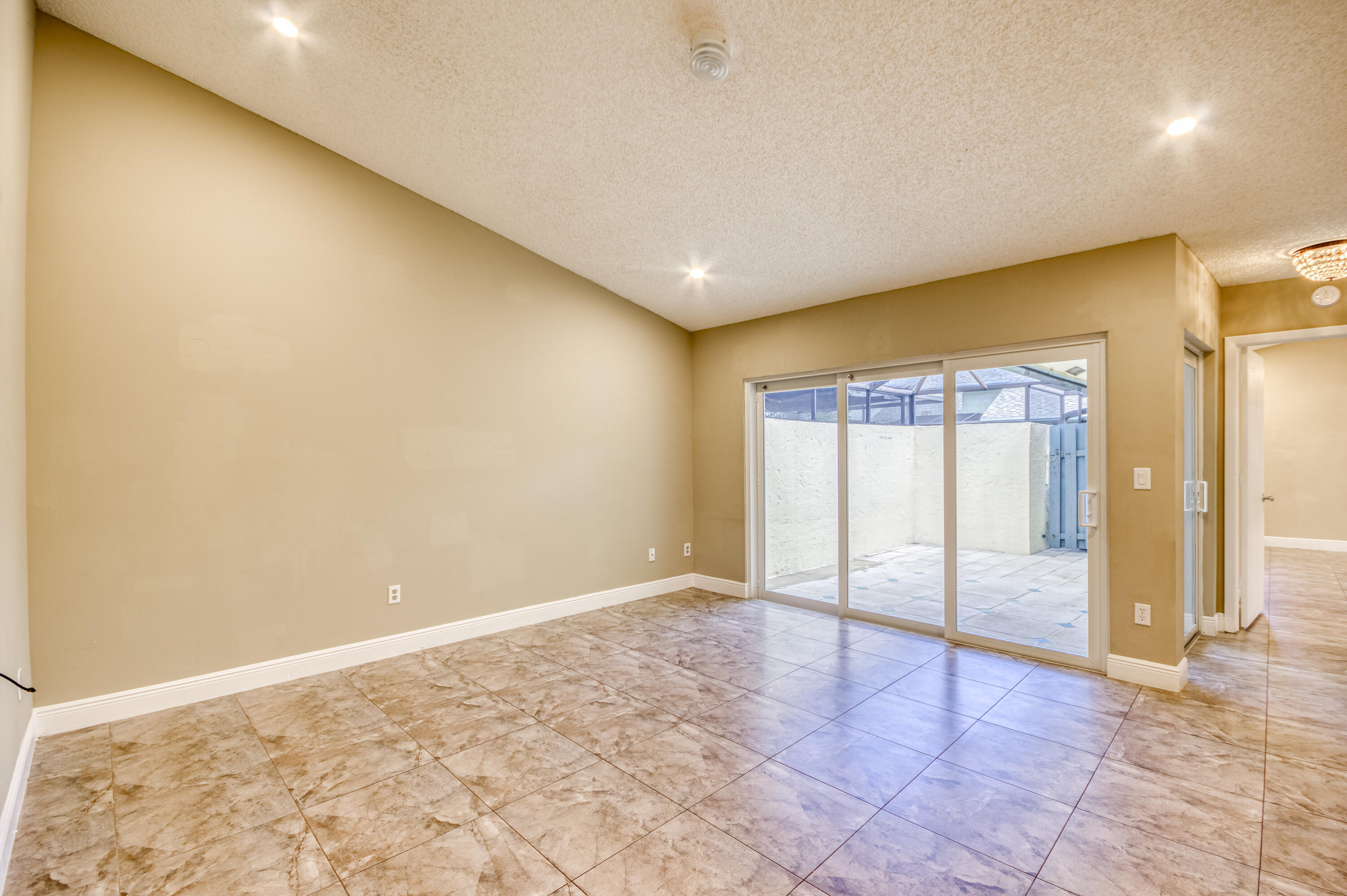 9109 Southwest 21st Street, Unit E Boca Raton, FL 33428 - Photo 4 of 24 a view of an empty room