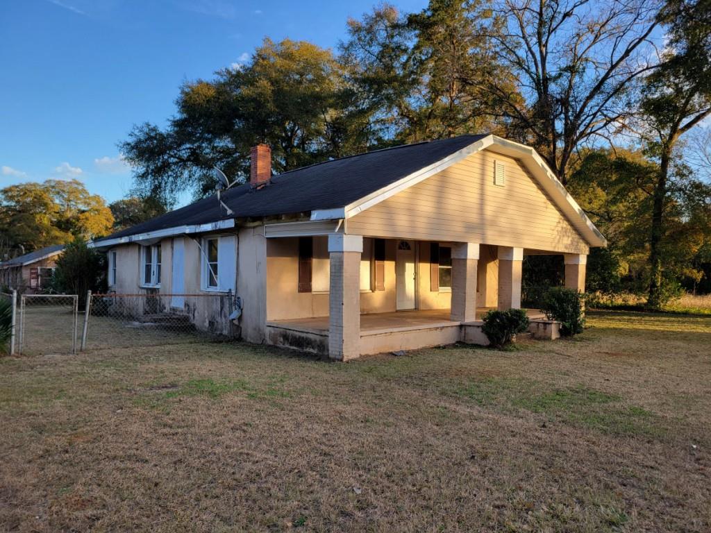 1310 Wf Ragin Drive Perry, GA 31069 - Photo 1 of 1 a view of a house with a yard